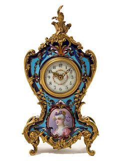 * A Louis XV Style Champleve Decorated Gilt Bronze Mounted Table Clock Height 9 3/4 inches.