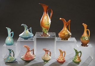 Group of Ten Pieces of Roseville Pottery, consisting of 617-10, Gardenia pitcher; 216-8, Wincraft Ewer;  981-6, Cosmos Ewer; 825-15 Thornapple Ewer;  
