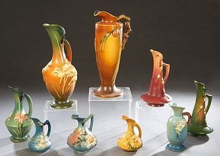 Group of Nine Pieces of Roseville Pottery, consisting of 174-1, Clematis Ewer; a 17 Clematis Ewer; 23-10, Zephyr Lily Ewer; 24-15 Zephyr Lily Ewer; 7-