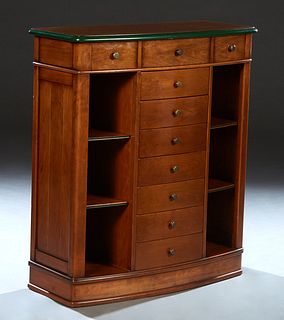 Diminutive French Louis Philippe Carved Cherry Bowfront Sideboard, 20th c., the green polychromed edge top over a long frieze drawer above a bank of s