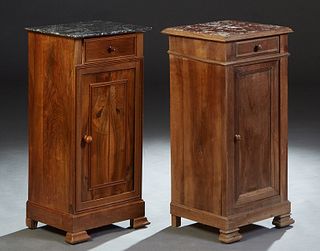 Near Pair of French Louis Philippe Carved Walnut Marble Top Nightstands, 19th c., one with a figured gray marble, the other with an inset figured brow