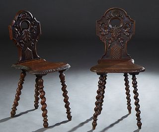 Pair of French Renaissance Style Carved Oak Hall Chairs, 19th c., the arched canted leaf carved back to a shaped seat, on splayed rope twist legs, H.-