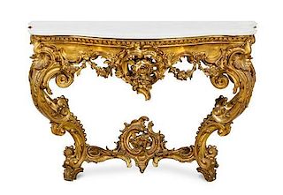 A Pair of Louis XV Style Giltwood Console Tables Height 34 x width 50 x depth 20 inches.