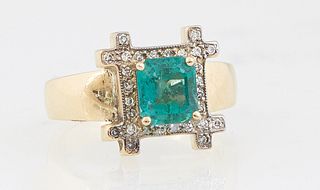 Lady's 14K Yellow Gold Dinner Ring, with a 1.39 ct. emerald within a square border of round diamonds, on a tapered wide band, total diamond wt.- .2 ct