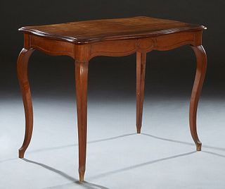 French Provincial Louis XV Style Carved Walnut Writing Table, early 20th c., the stepped serpentine top over an arched skirt with one side frieze draw