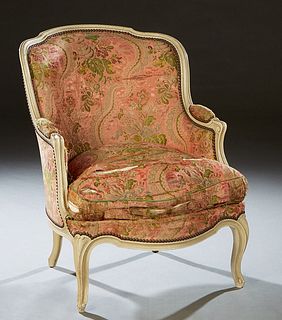French Louis XV Style Polychromed Beech Bergere, early 20th c., the curved canted back flanked by upholstered arms to a bowed seat, with a removable c