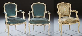 Group of Three French Polychromed Carved Beech Louis XV Style Fauteuils, one with an arched floral carved crest rail over an upholstered back, upholst