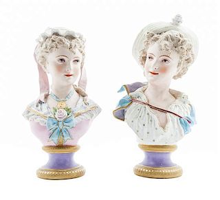 * A Pair of Continental Bisque Porcelain Busts Height 15 inches.
