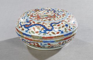 Oriental Porcelain Covered Circular Box, 20th c., with dragon and leaf decoration, H.- 2 3/4 in., Dia.- 5 3/4 in.