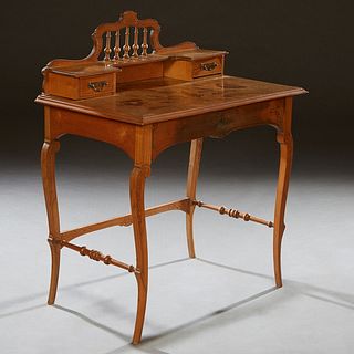 Art Nouveau Inlaid Cherry Writing Table, c. 1900, in the manner of Emile Galle, the arched spindled back over two small drawers, on a floral marquetry