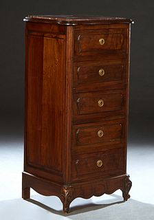 French Louis XV Style Carved Walnut Marble Top Chiffonier, 20th c., the serpentine top with an inset highly figured rouge marble over a bank of five f