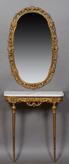 French Louis XVI Style Brass Marble Top Console Table and Mirror, 20th c., the oval mirror with a pierced brass frame with floral and scroll decoratio
