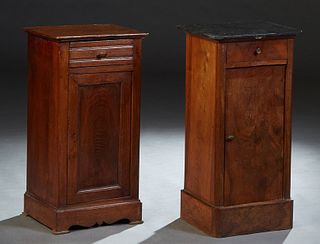 Two French Carved Walnut Nightstands, 19th c., one with a figured black rounded corner marble top; the other with a wood top, both over a frieze drawe