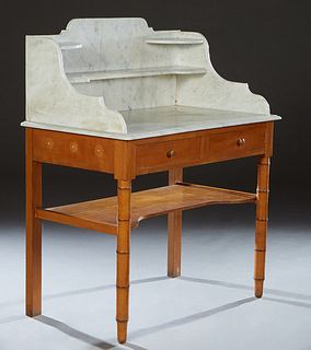 French Carved Cherry Faux Bamboo Marble Top Washstand, 19th c., the arched back splash with two short shelves and a long shelf, atop a dished white ma
