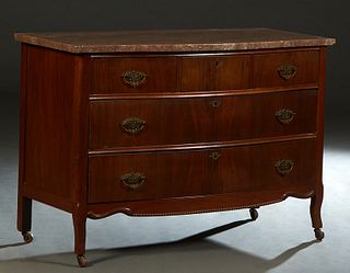 American Carved Walnut Marble Top Chest, late 19th c., the highly figured bowfront rouge marble over three bowed frieze drawers and two deep drawers, 