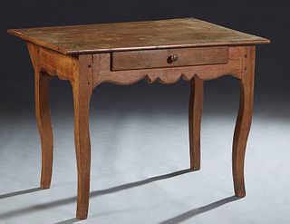 French Louis XV Style Carved Beech Writing Table, late 19th c., the rectangular top over a scalloped skirt with one frieze drawer, on tapered square c