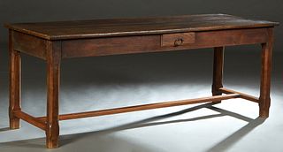 French Provincial Carved Oak Farmhouse Table, 19th c., the rectangular top over a drawer on one long side and one end, on chamfered legs joined by an 