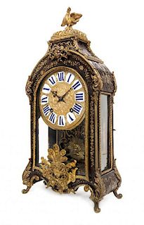 A Louis XVI Gilt Metal Mounted Boulle Marquetry Bracket Clock Height 24 inches.