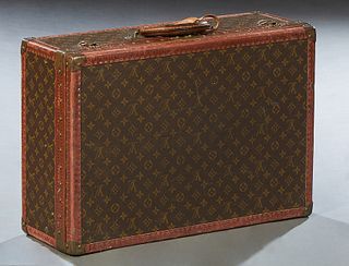Vintage Louis Vuitton Small Hard Suitcase, with leather Louis Vuitton luggage tag, H.- 16 1/2 in., W.- 24 in., D.- 8 1/2 in.