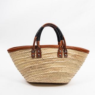 Balenciaga Bistrot Panier Tote Bag, in raffia grass with brown leather accents and silver hardware, the interior of the bag with a brown leather side 