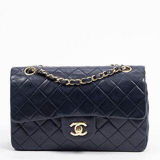 Chanel Classic Double Flap Shoulder Bag, in navy blue quilted calf leather with gold hardware and interlaced chain, opening to a navy leather interior