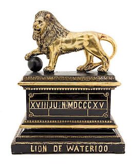 * A Carved Giltwood Model of the Lion of Waterloo Height 13 1/4 inches.