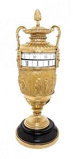 A Neoclassical Polished Bronze Annular Clock Height 17 3/4 inches.