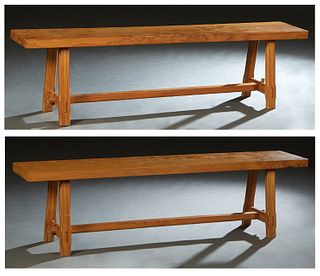 Pair of French Provincial Carved Walnut Benches, 20th c.,the thick rectangular top on splayed trestle legs joined by a rectangular stretcher, H.- 19 i