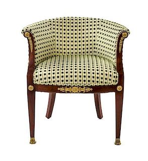 * An Empire Gilt Bronze Mounted Mahogany Tub Chair Height 28 3/4 x width 27 x depth 21 inches.