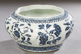 Large Chinese Porcelain Lobed Baluster Bowl, 20th c., with floral decoration in blue on a white ground, with damage under the base, H.- 7 in., Dia.- 1