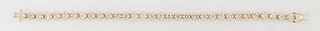 14K Yellow Gold Tennis Bracelet, each of the 32 links with a round diamond, total diamond wt.- 7.35 ct., L- 7 1/4 in., with appraisal.