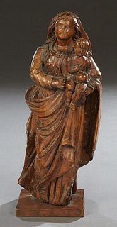 Flemish Carved Wooden "Santo" figure, 19th c., of the Madonna and child, on an integral rectangular plinth, H. 14 1/2 in., W.- 4 3/4 in., 3 3/8 in.