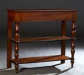 French Provincial Carved Walnut Serving Trolley, c. 1870, the rectangular top over a long frieze drawer, on large bobbin turned supports to a center a