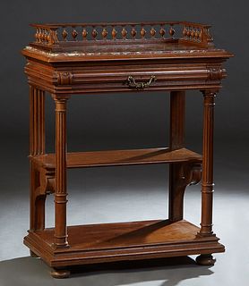 Diminutive French Henri II Style Carved Walnut Marble Top Server, c. 1880, with a 3/4 spindled gallery atop an inset highly figured brown marble, abov