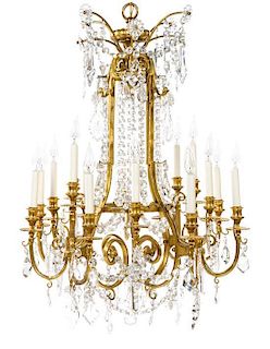 * A French Gilt Bronze Sixteen-Light Chandelier Height 37 inches.