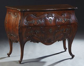 Louis XV Style Carved Mahogany Bombe Commode, 20th c., the serpentine stepped cookie corner top over two deep serpentine drawers, flanked by bombe sid
