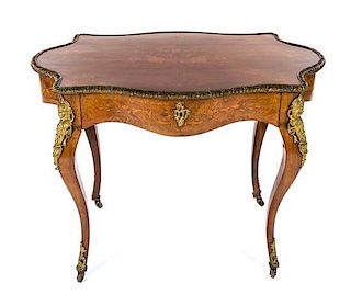 A Napoleon III Gilt Bronze Mounted Marquetry Center Table Height 30 3/4 x width 40 1/4 x depth 26 1/2 inches.