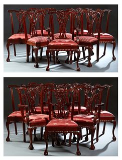 Set of Sixteen Carved Mahogany Chippendale Style Dining Chairs, 20th c., consisting of twelve side chairs and four armchairs, the shell carved serpent