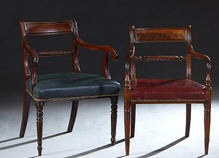 Two Similar English Carved Mahogany Armchairs, 19th c., one with a curved horizontal splat back over curved arms and a brown leather seat with iron ta
