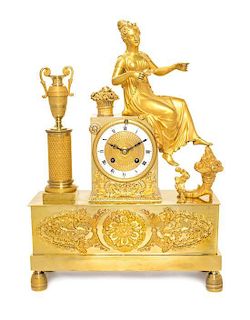 A French Gilt Bronze Figural Clock Height 16 1/4 inches.