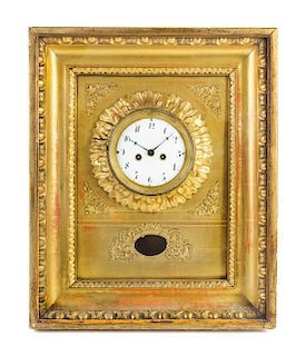 * A French Giltwood Wall Clock Height 17 1/2 x width 14 1/4 inches.