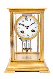 * A French Gilt Metal Regulator Clock Height 8 3/4 inches.