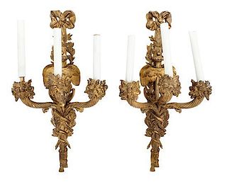 A Pair of Continental Gilt Bronze Three-Light Sconces Height 21 1/2 inches.