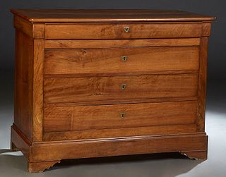 French Provincial Louis Philippe Carved Walnut Commode, 19th c., the rounded corner and edge top over a setback frieze drawer above three deep drawers