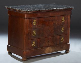 Louis Philippe Carved Walnut Marble Top Commode, c. 1860, the rounded edge and corner figured gray marble over a setback cavetto frieze drawer and thr
