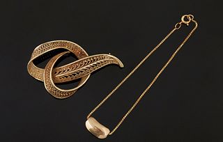 Two Pieces of 14K Yellow Gold Jewelry, consisting of a Mignon Faget Bean Bracelet, and a leaf brooch, now lacking a pin, Brooch- H.- 1 1/8 in., W.- 2 