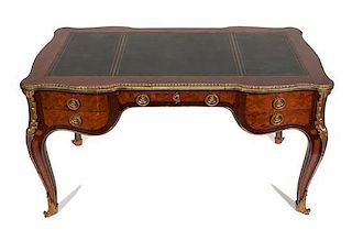 A Louis XV Style Gilt Bronze Mounted Parquetry Bureau Plat Height 30 1/4 x width 55 x depth 30 inches.