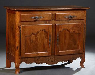 French Provincial Louis XV Style Carved Cherry Sideboard, 19th c., the rounded corner and edge top over two frieze drawers above double cupboard doors