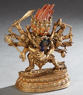 Tibetan-Chinese Bronze Figure of Ten Arm Samvara and Consort, 19th c., with polychromed decoration, on a stepped integral base with relief decoration,