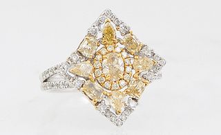 Lady's 14K White and Yellow Gold Dinner Ring, the pierced square top with a central oval diamond, within a border of tiny round diamonds, flanked by n